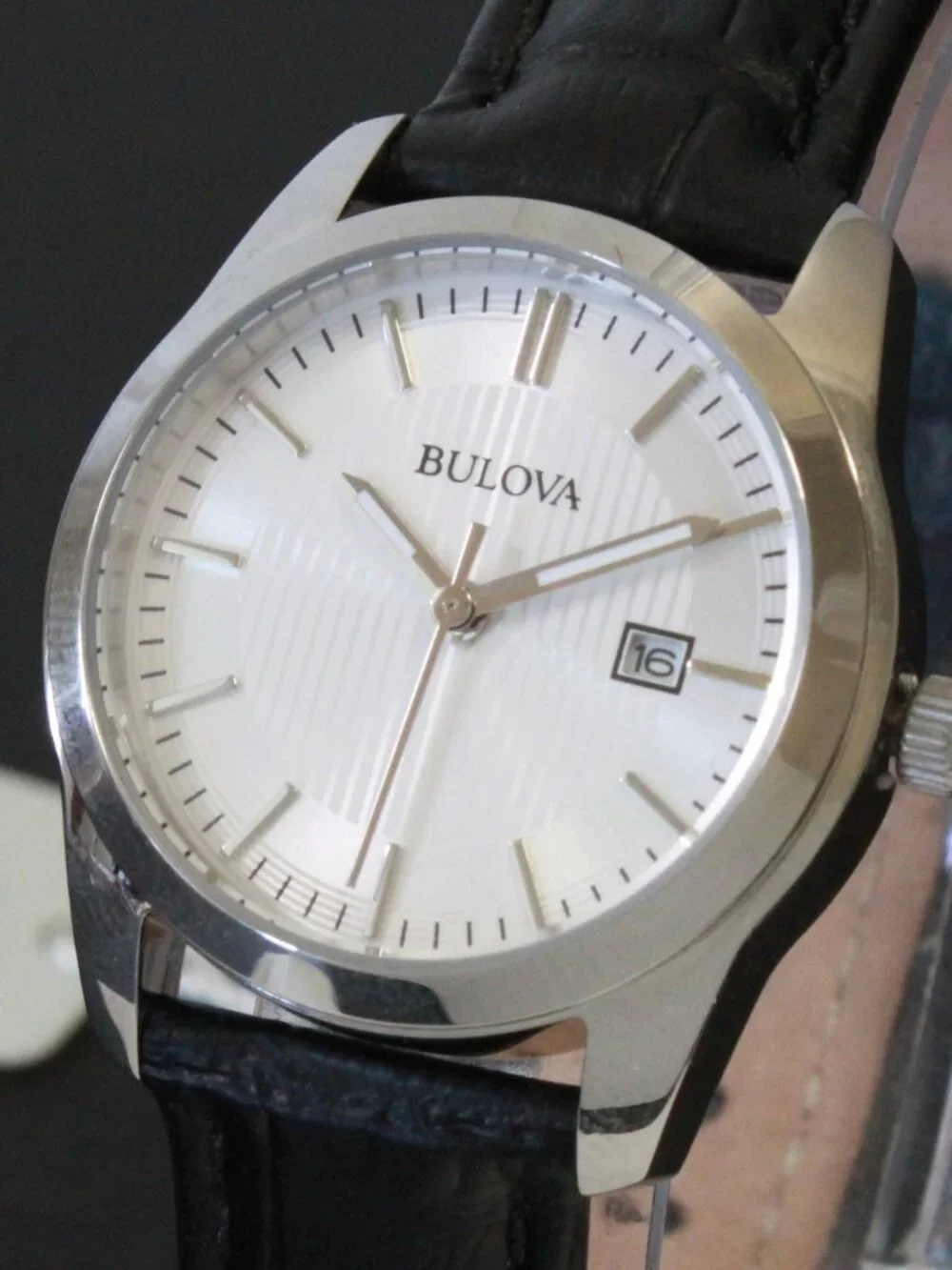 Bulova Ladies Classic Dress Watch Stainless, Silver Textured Dial, Black Strap